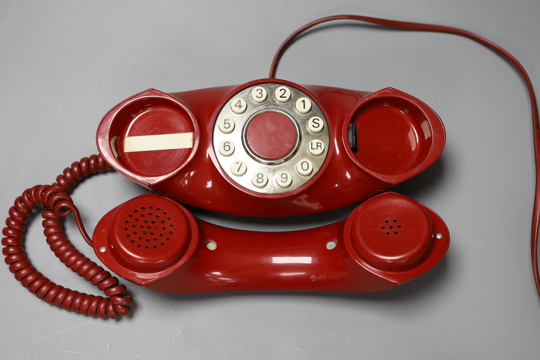 Two Autophon telephone handsets, AUG002 and AUG005, 24 cms wide